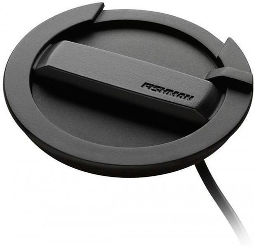 Fishman Neo-Buster humbucking magnetic soundhole pickup with integrated feedback-reducing soundhole cover installed on an acoustic guitar.