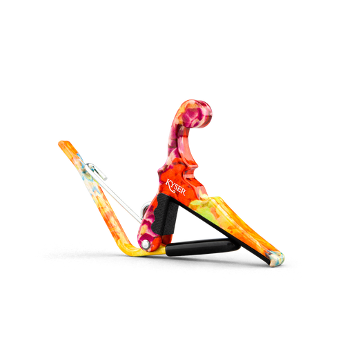 Kyser Quick-Change ukulele capo in Hawaiian Lei finish, designed for small ukulele necks with a durable spring-loaded clamp.