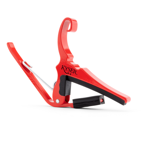 Kyser Quick-Change acoustic guitar capo in Lipstick Red finish with spring-loaded trigger mechanism.