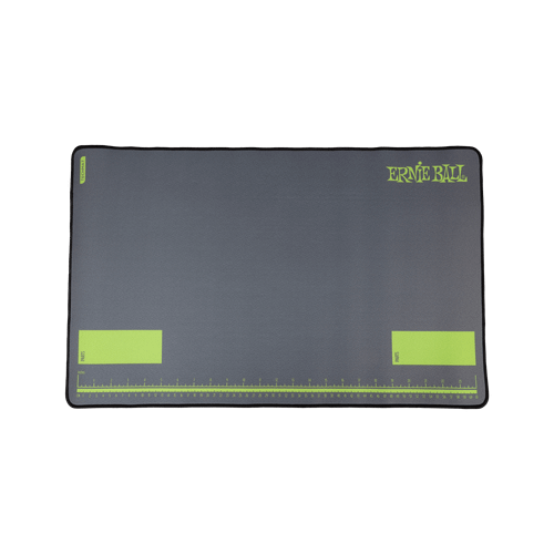 Ernie Ball TechMat guitar and bass maintenance mat with cushioned fabric surface, non-slip rubber base and high-visibility metric and imperial rulers.