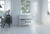 Roland HP704 SuperNATURAL Digital Piano in White with matching bench, PHA-50 keyboard, four-speaker projection system, and elegant slim cabinet design.