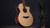 Faith Venus Hi Gloss Natural acoustic-electric guitar with solid Engelmann spruce top, 3-piece Indonesian rosewood back and sides, cutaway body, flamed maple binding, Ebony fittings and Fishman INK3 electronics.