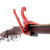 Kyser Quick-Change acoustic guitar capo in Lipstick Red finish with spring-loaded trigger mechanism.