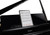 Roland GP-6 premium digital baby grand piano in polished ebony finish with matching piano bench.