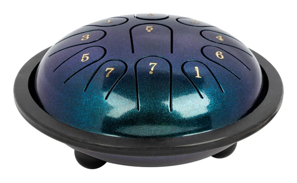 Mano 6-inch 11-note tongue drum in Pearl Teal with mallets and accessories.