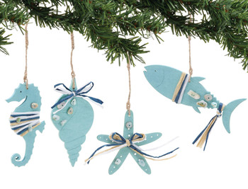 boxed coastal wooden sea life ornaments seahorse, shell, starfish, fish