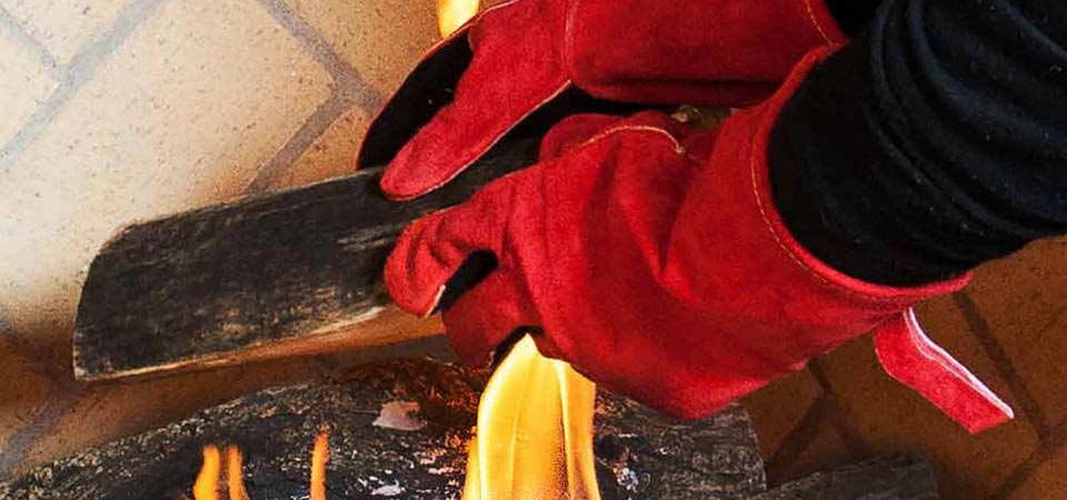 Modern Wood Burning Stove with Accessories and Red Gloves Next To it. Wood  Burning Stove with Orange Yellow Flames Stock Photo - Image of glowing,  home: 199860238