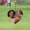 The back of the personalized chime sail has a picture of your loved one along with their name and dates.