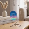 Memory of a Faithful Friend personalized glass pet memorial ornament shown on optional display stand