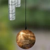 Our Son's Light Memorial Chime is personalized with her name and dates on the back of the sail