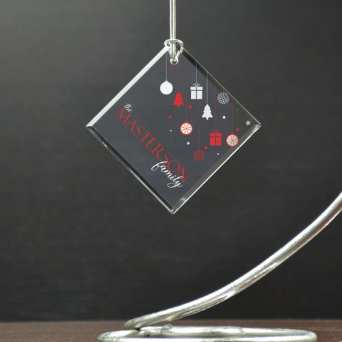 Cute personalized ornament features family name and Christmas theme.