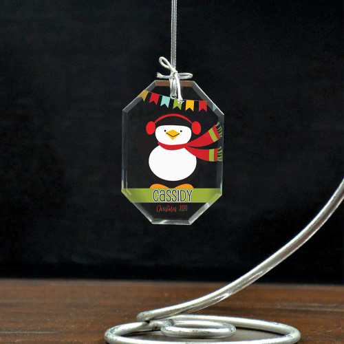 This cute penguin ornament is personalized with a first name.