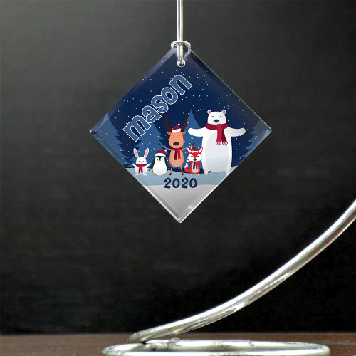 Diamond shaped glass ornament is personalized with child's name and featurs cute woodland animals