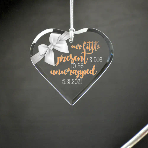 Personalized heart shaped ornament is a unique way to make a special announcement