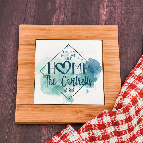 There's No Place Like Home Personalized trivet has family last name and established year.