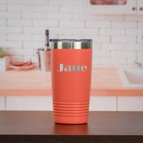 Personalized 20 ounce travel mug shown in Coral.