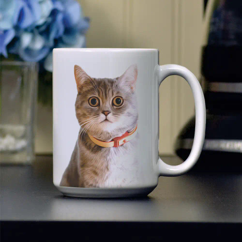 Coffee mug is personalized with a photo of a cat