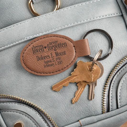 Never Forgotten Oval Key Chain in Dark Brown, personalized with loved one's name and dates