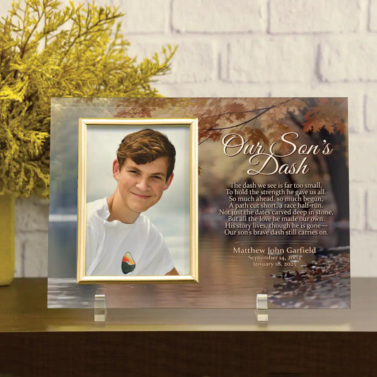 Our Son's Dash glass memorial frame engraved with The Dash poem, personalized with name and dates, displayed on easel legs