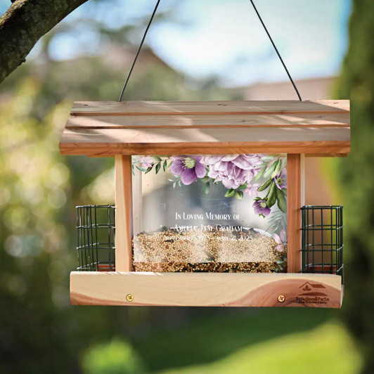 Personalized In Loving Memory of Bird feeder has loved one's name and dates on both sides of feeder. Personalized In Loving Memory of Bird feeder has loved one's name and dates on both sides of feeder.