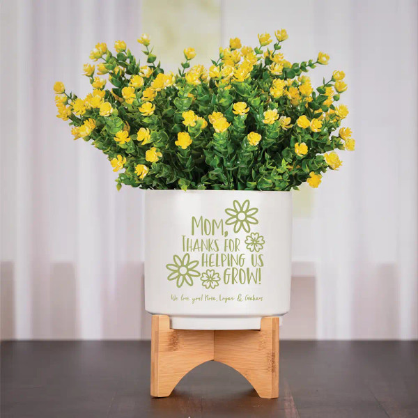 Personalized flower pot for Mom is laser engraved and includes a short message. Shown with moss green paint fill.