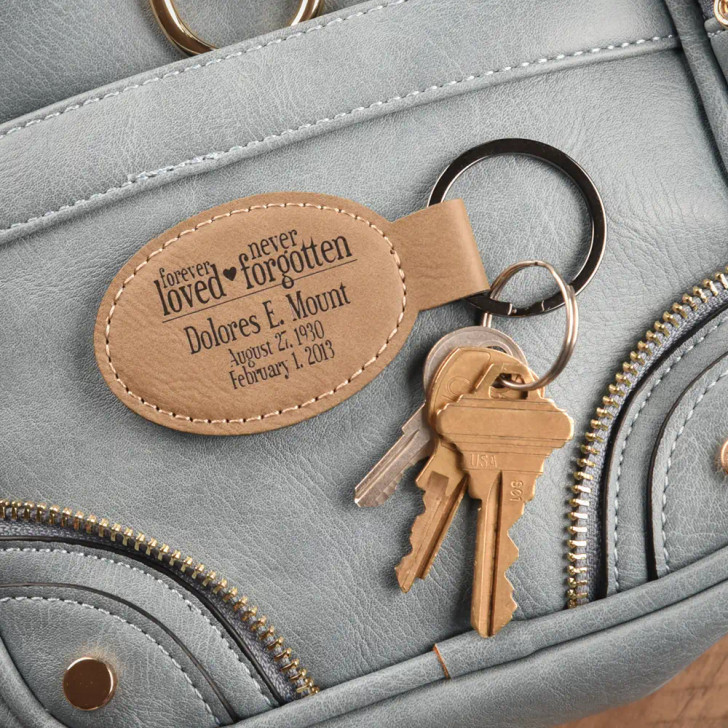 Never Forgotten Oval Key Chain in Light Brown, personalized with loved one's name and dates