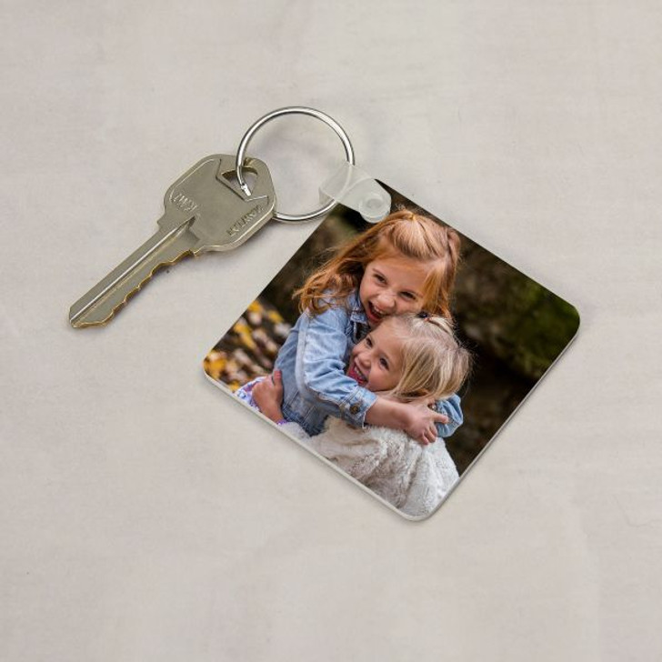 Back of personalized keychain for mom has a picture of her children