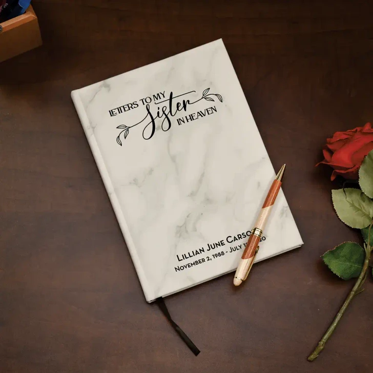 My Sister In Heaven Journal in white marble, personalized with her name and dates