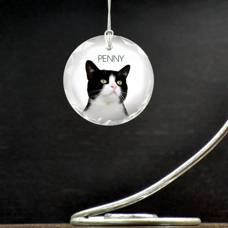 Ornament is personalized with a photo of your cat