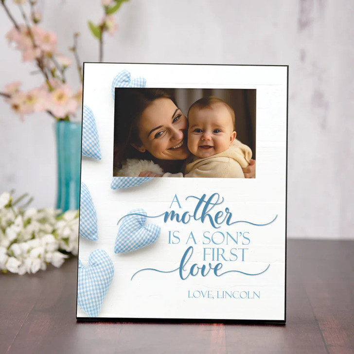 Personalized Mom and Son Picture Frame says "A Mother is a son's first love" and is signed with son's name