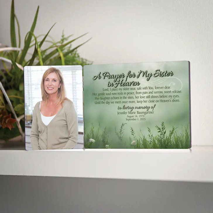 This memorial plaque features 2 smaller plaques on a hinge and personalized with your sister's picture on the smaller, left plaque.