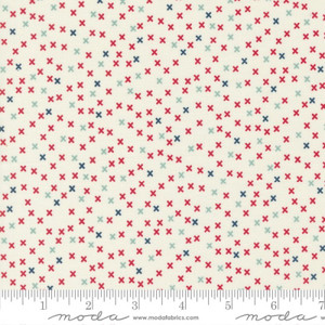 x's in red, navy and powder blue on cream background