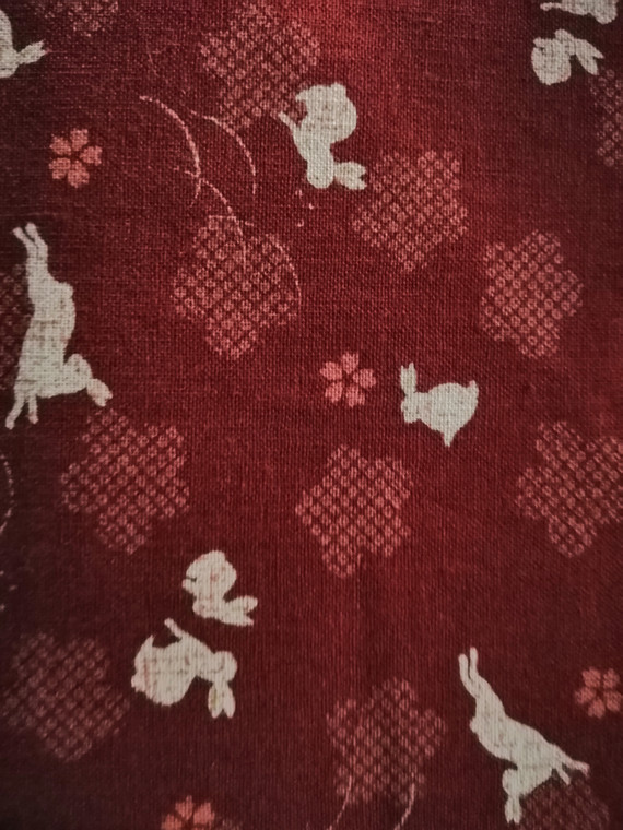 Kura Col 103 Red rabbits - per half metre length