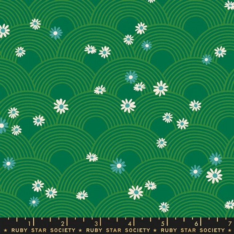 retro feel fabric, small white daisies on green background with green rainbows