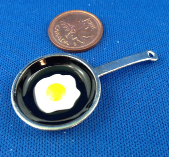 Black Frying Pan with Egg