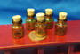 Set of 5 Tiny Glass Bottles with Corks - amber