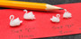 Pair of Miniature Plastic Swans