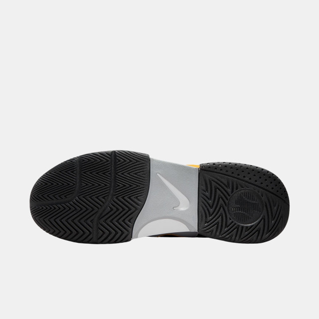 grey and black nike tennis shoes