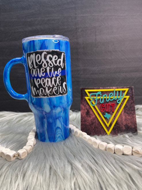 #23 Peacemaker Blue Woodgrain 32 Travel Mug