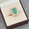 Second Hand 18ct Gold Oval Emerald & Diamond Cluster Ring