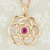 9ct Gold Ruby Flower Pendant and Chain
