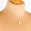 18ct White Gold Pearl and Diamond Lady Sybil Pendant by Ungar and Ungar - Worn View