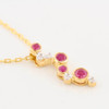9ct Gold Ruby & Diamond Cascade Pendant Necklace - Angled View