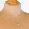 9ct White Gold Aquamarine and Diamond Cluster Pendant Necklace - Worn View