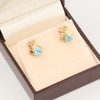 9ct Gold Blue Topaz and Diamond Criss-Cross Stud Earrings - In Box