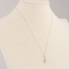 Second Hand 9ct White Gold Diamond Figure of Eight Pendant and Chain - Worn View