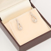 9ct White Gold Diamond Cross-Over Earrings - In Box
