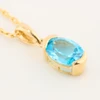 9ct Gold Blue Topaz Pendant with Chain - Angled View
