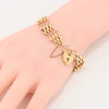 Second Hand 9ct Gold 4 Bar Gate Bracelet with Heart Padlock - Worn View