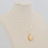 Second Hand 9ct Gold Floral Locket - Worn View